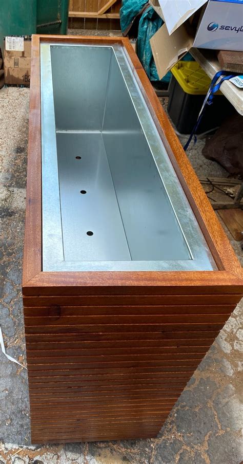 custom planter metal boxes made to order|fabricating custom mahogany planter boxes.